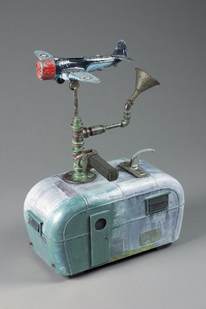 Filler’ Up
2018
Wood, steel, paint, found objects
18”x14”x8”